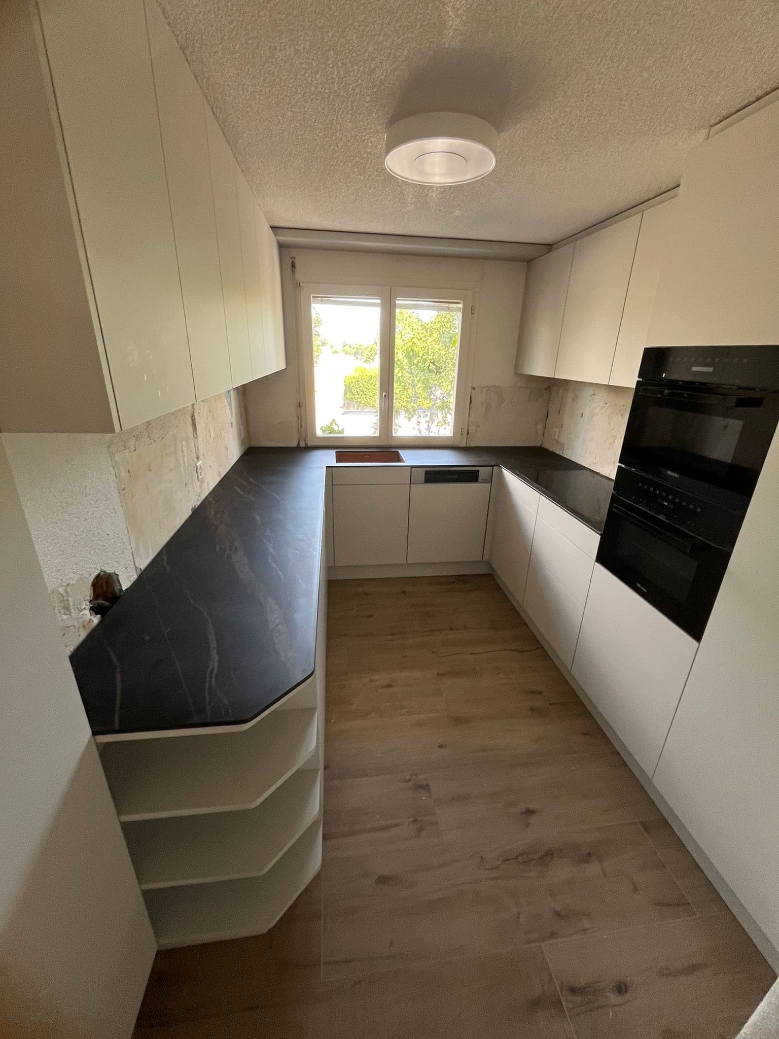 Eigentum Aargau — Laminam Noir Desir 12mm matt